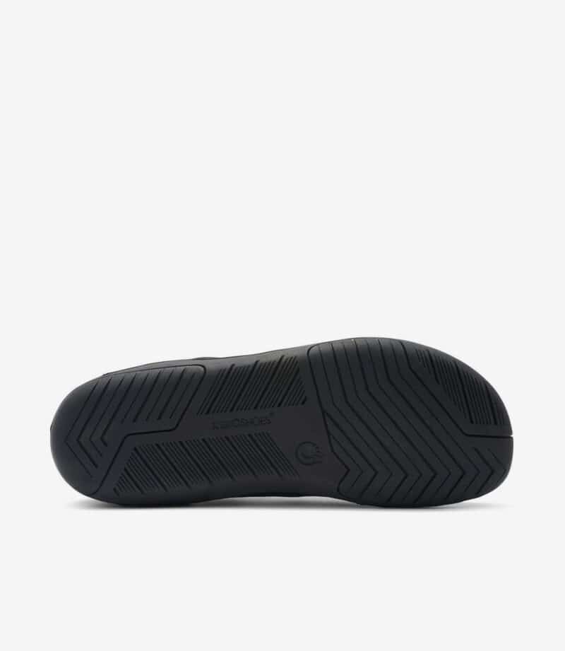 Sort gummiydersål på Xero Nexus Knit Herre barfodssko med gribeprofil; minimalistisk stil, bred tåboks, helt sort design.