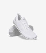 Hvide Xero Nexus Knit minimalistiske barfodssko til mænd, overdel i mesh, bred tåboks, sildebenssål, en sko på højkant.