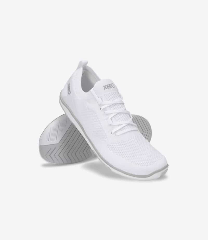 Hvide Xero Nexus Knit minimalistiske barfodssko til mænd, overdel i mesh, bred tåboks, sildebenssål, en sko på højkant.