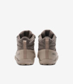 Brun og tan Xero Scrambler Trail Mid WP barfodsvandresko, bred tåboks, trækflige, robuste såler, minimalistisk udendørs stil.