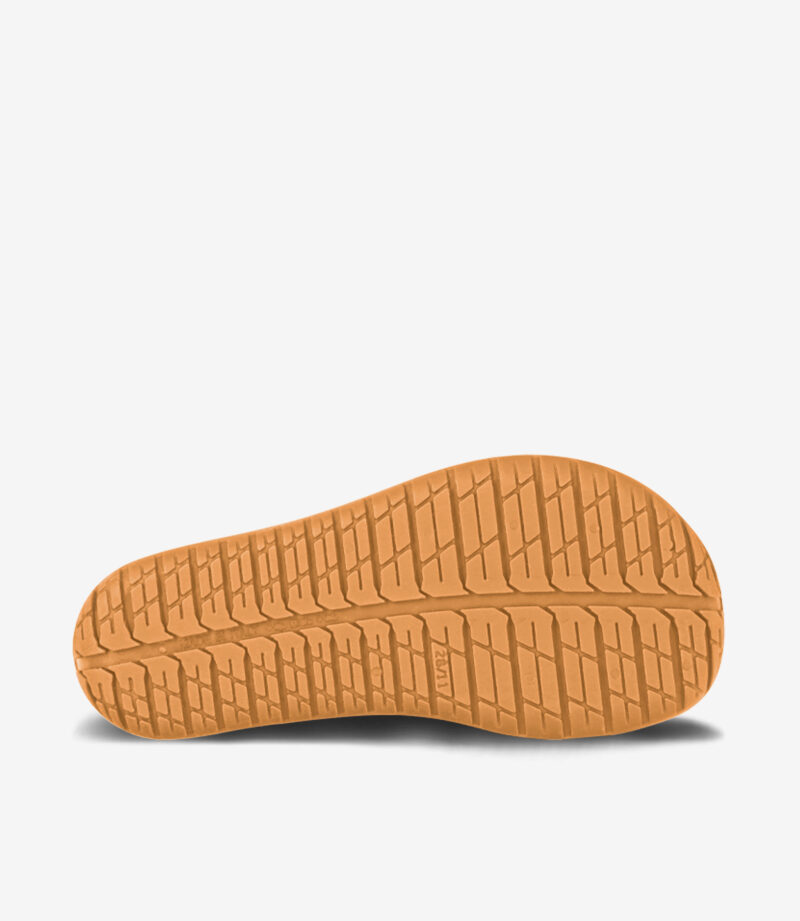 Brun minimalistisk barfodsskosål med gribende mønstret slidbane, bred tåboks, gummimateriale, vist på hvid baggrund.