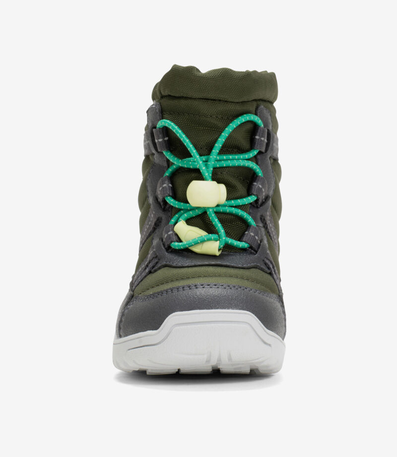 Xero Alpine Women's barfodsvandrestøvle i sort, minimalistisk design, bred tåboks, hvid tekstureret sål på hvid baggrund.